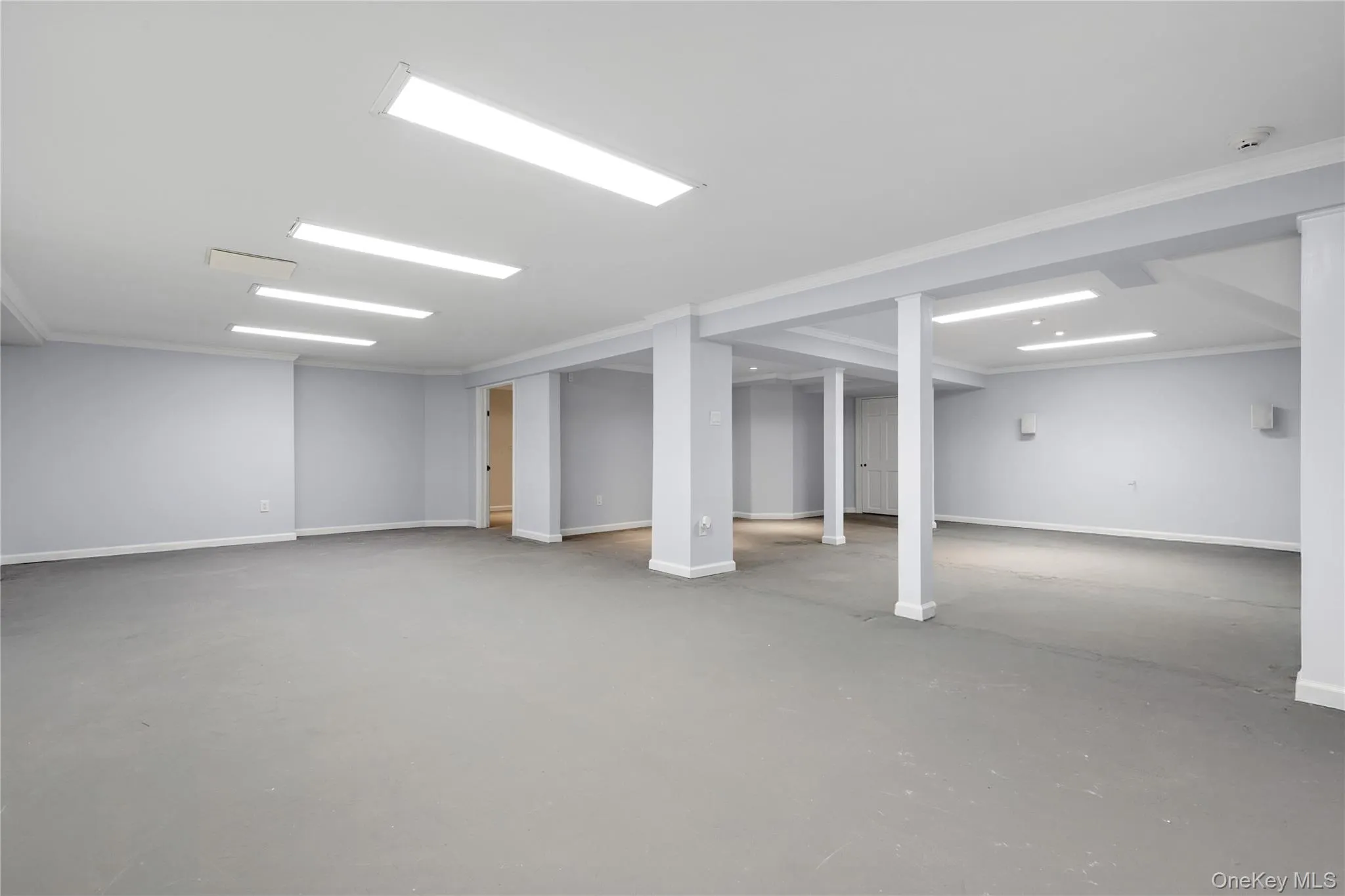 Lower level (laundry room & additional storage room in rear) Lower level (laundry room & additional storage room in rear)