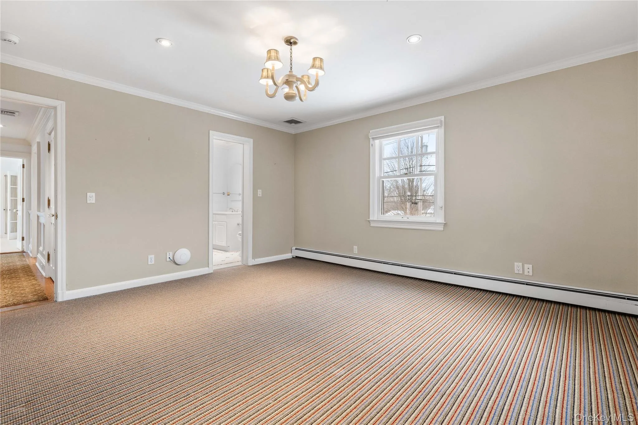 Family bedroom features wall-to-wall carpeting full bath (in rear) Family bedroom features wall-to-wall carpeting full bath (in rear)