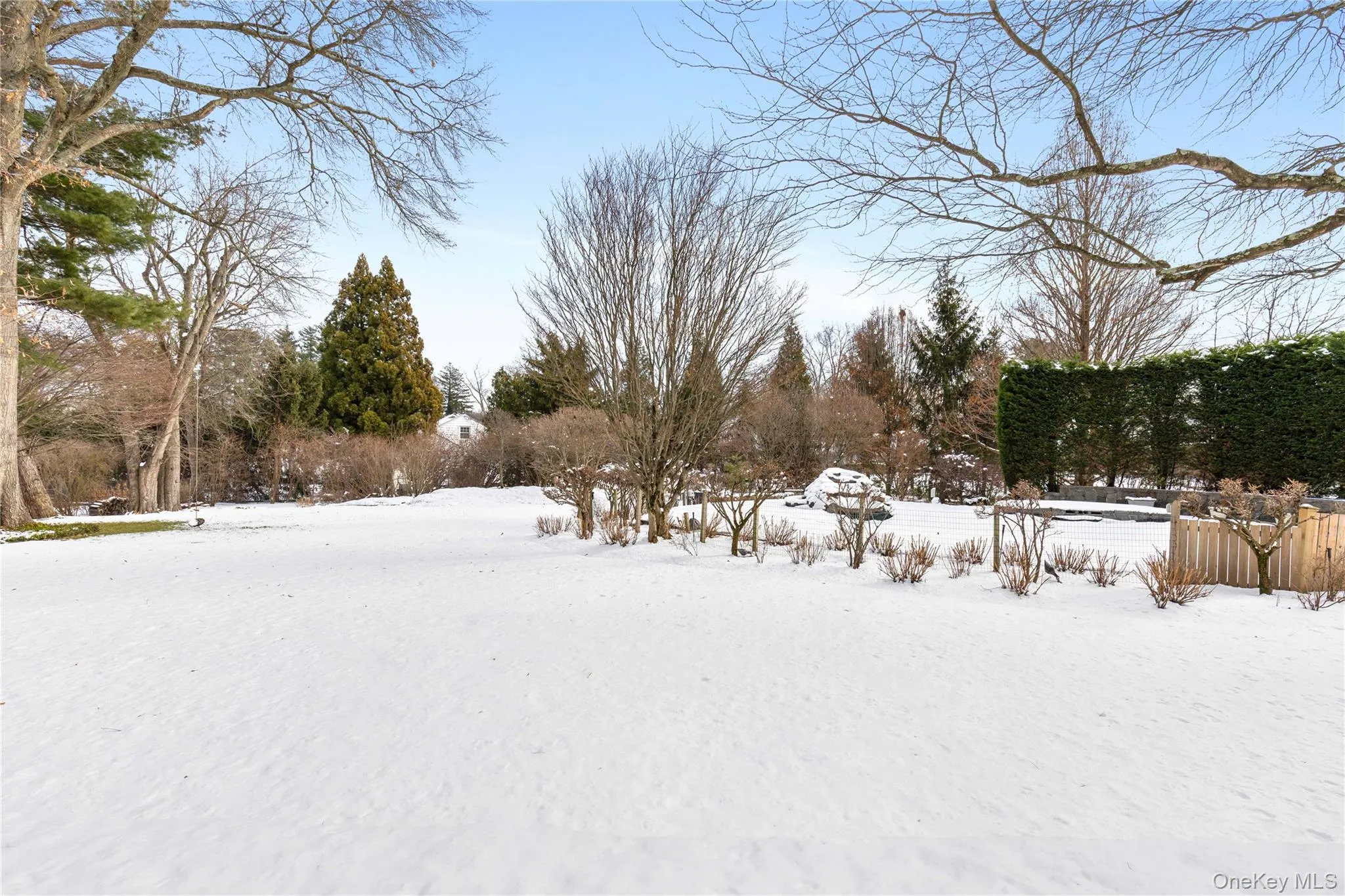 Winter wonderland for now...a private and fenced property boasts a saltwater pool with stone waterfall and large hot tub, bocce court, abundant vegetable garden.... imagine these resort amenities come Spring/Summer Winter wonderland for now...a private and fenced property boasts a saltwater pool with stone waterfall and large hot tub, bocce court, abundant vegetable garden.... imagine these resort amenities come Spring/Summer