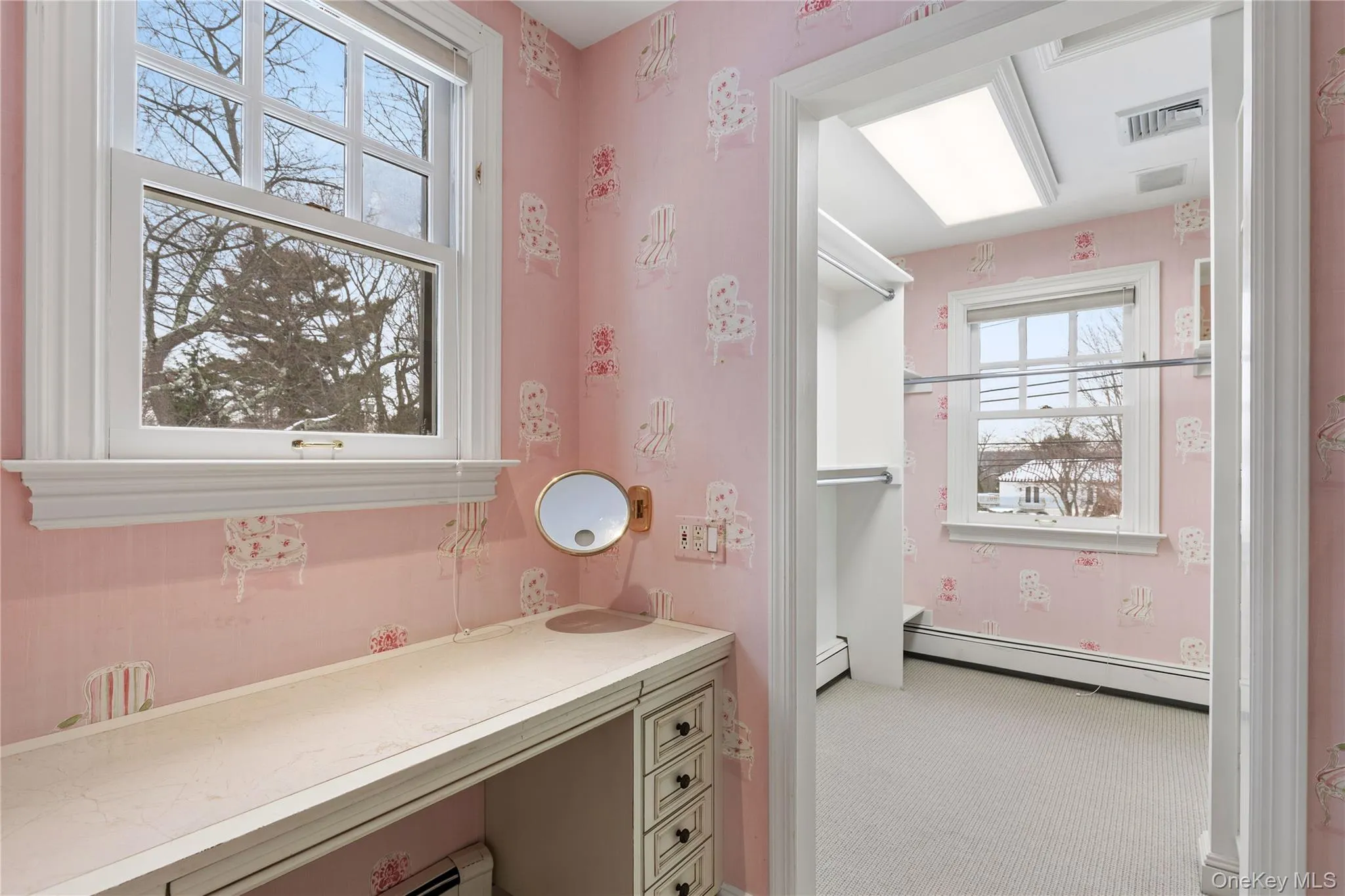 Bright dressing area and walk-in closet Bright dressing area and walk-in closet