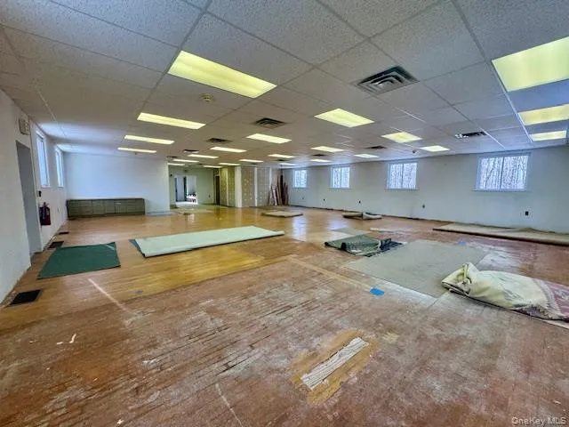 Workout area featuring a paneled ceiling Workout area featuring a paneled ceiling