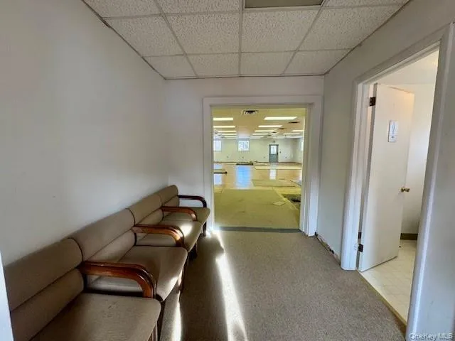 Entry with seating area. Entry with seating area.