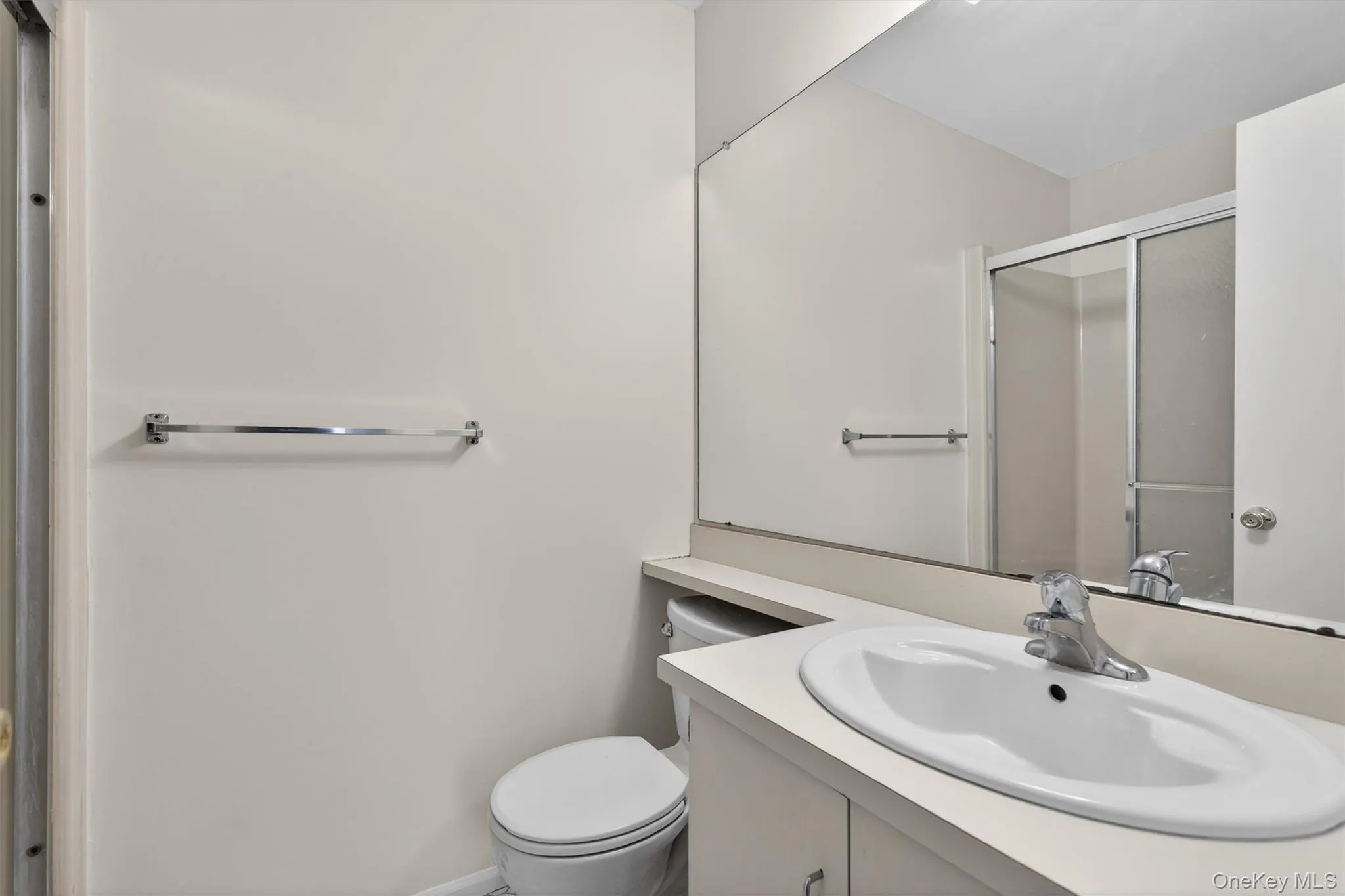 Full bath with a stall shower and vanity Full bath with a stall shower and vanity