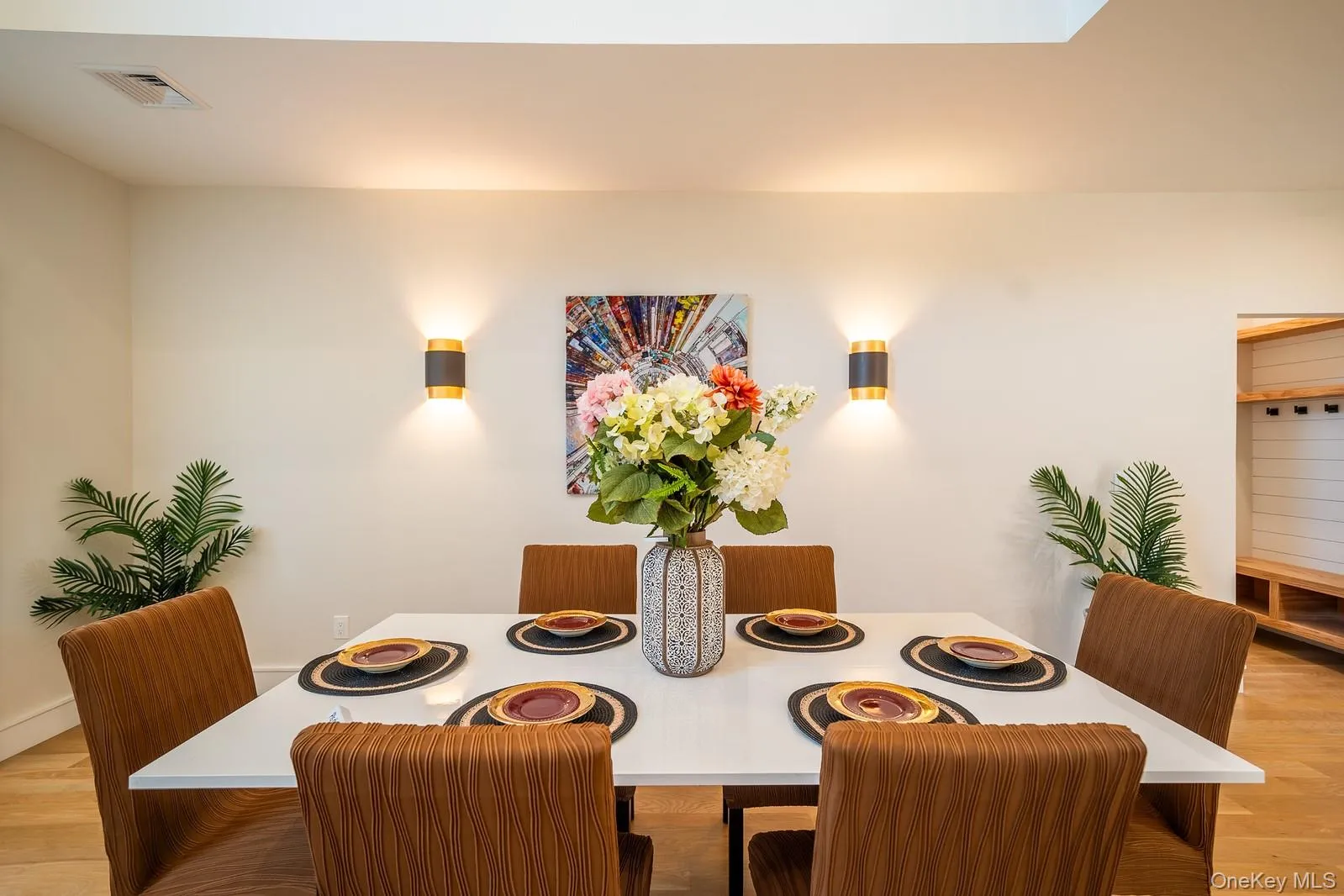 Dining area with wood finished floors Dining area with wood finished floors