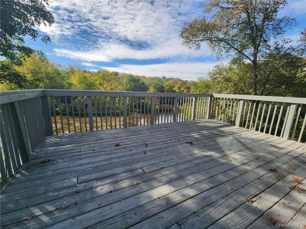 Deck featuring a wooded view Deck featuring a wooded view