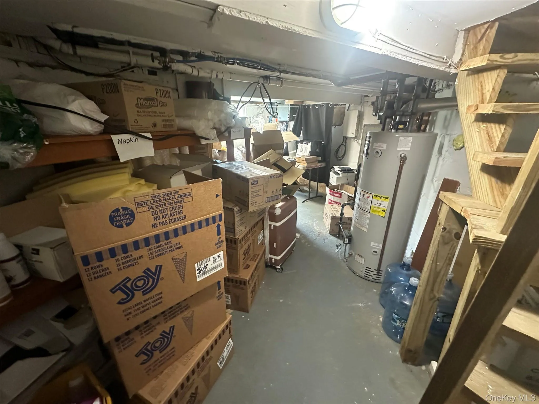 Unfinished basement with gas water heater Unfinished basement with gas water heater