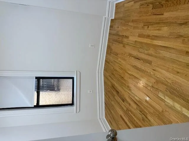 Unfurnished room featuring light wood-type flooring Unfurnished room featuring light wood-type flooring