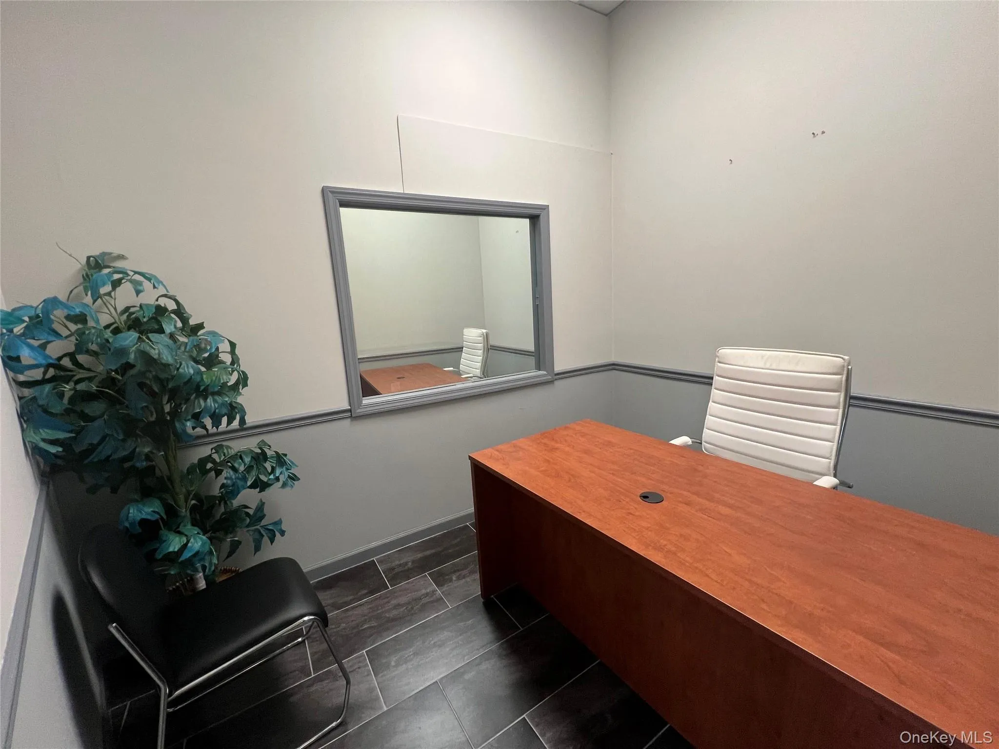 Home office featuring baseboards Home office featuring baseboards