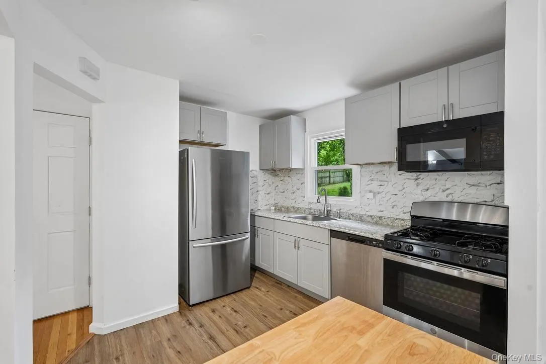 Kitchen with stainless steel appliances Kitchen with stainless steel appliances