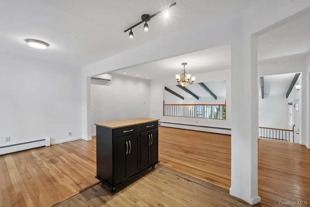 Movable island with view of dining area and living room, Movable island with view of dining area and living room,