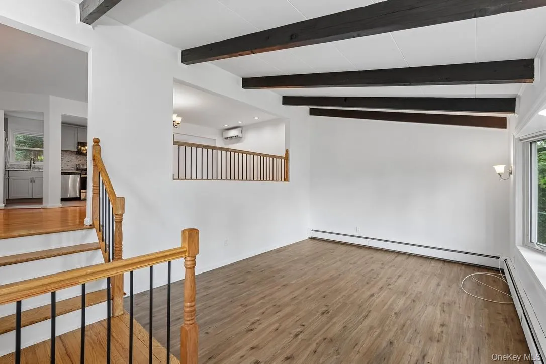 Family room with stairs to living room Family room with stairs to living room