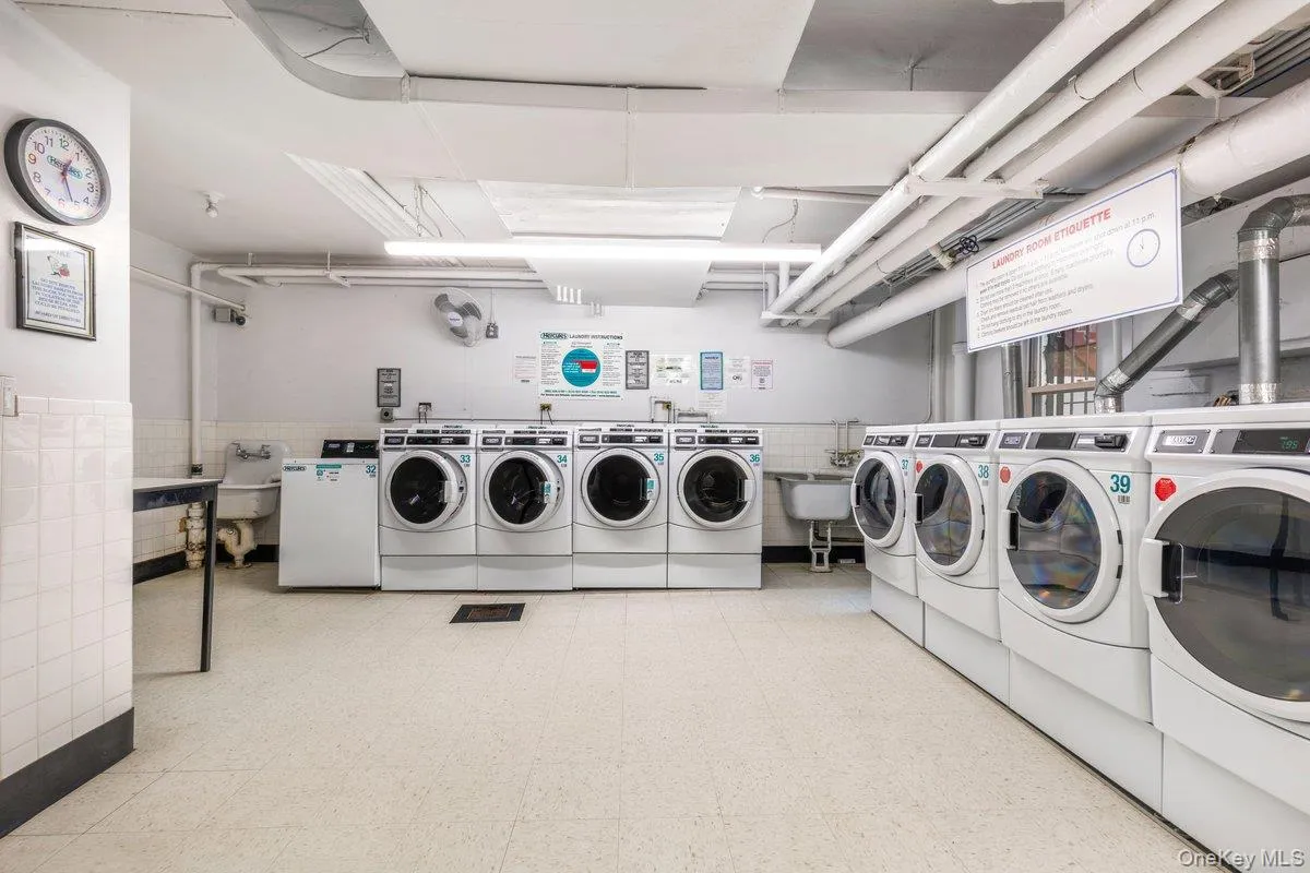 Laundry room featuring washer and dryer Laundry room featuring washer and dryer