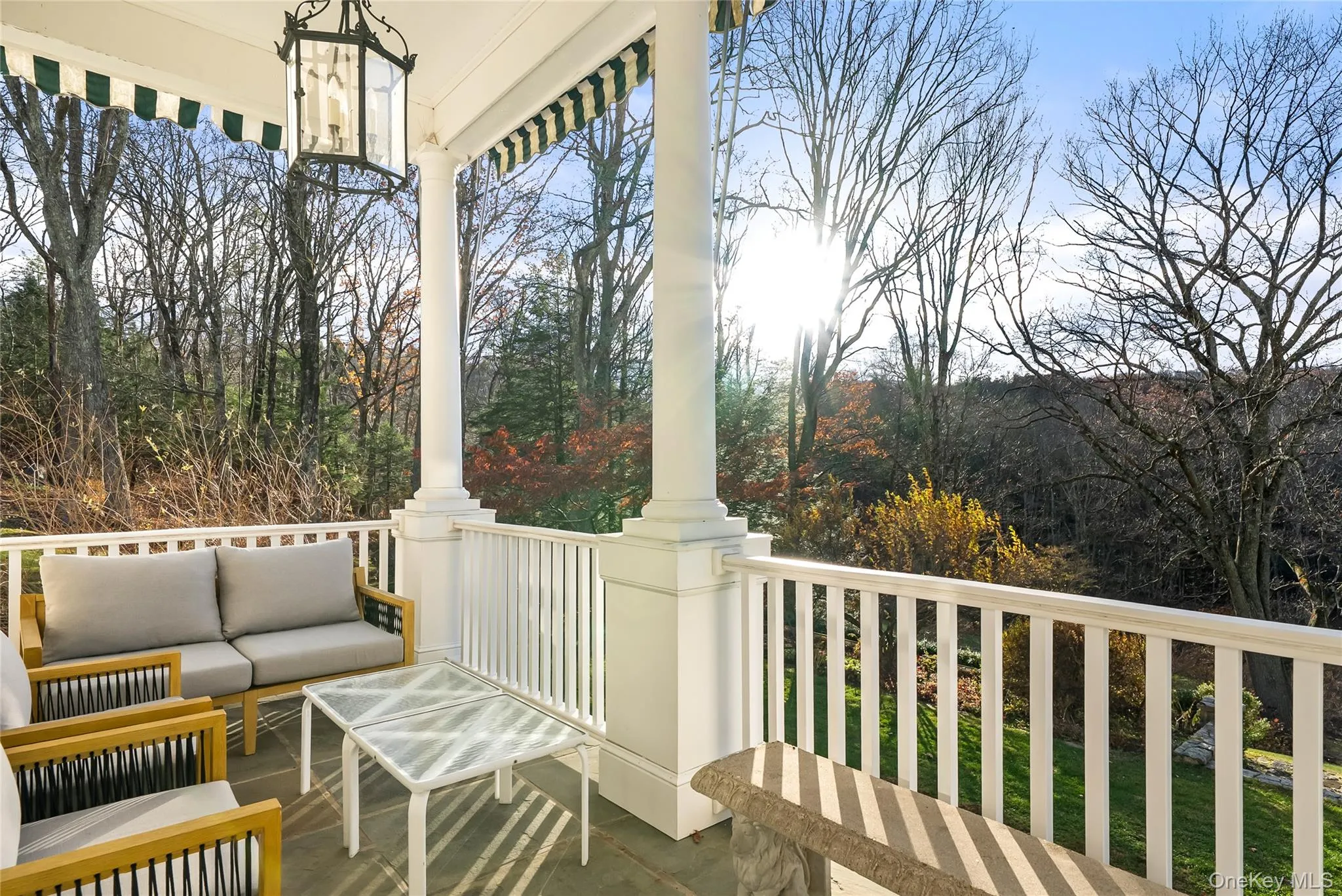 Wooden terrace featuring an outdoor living space Wooden terrace featuring an outdoor living space