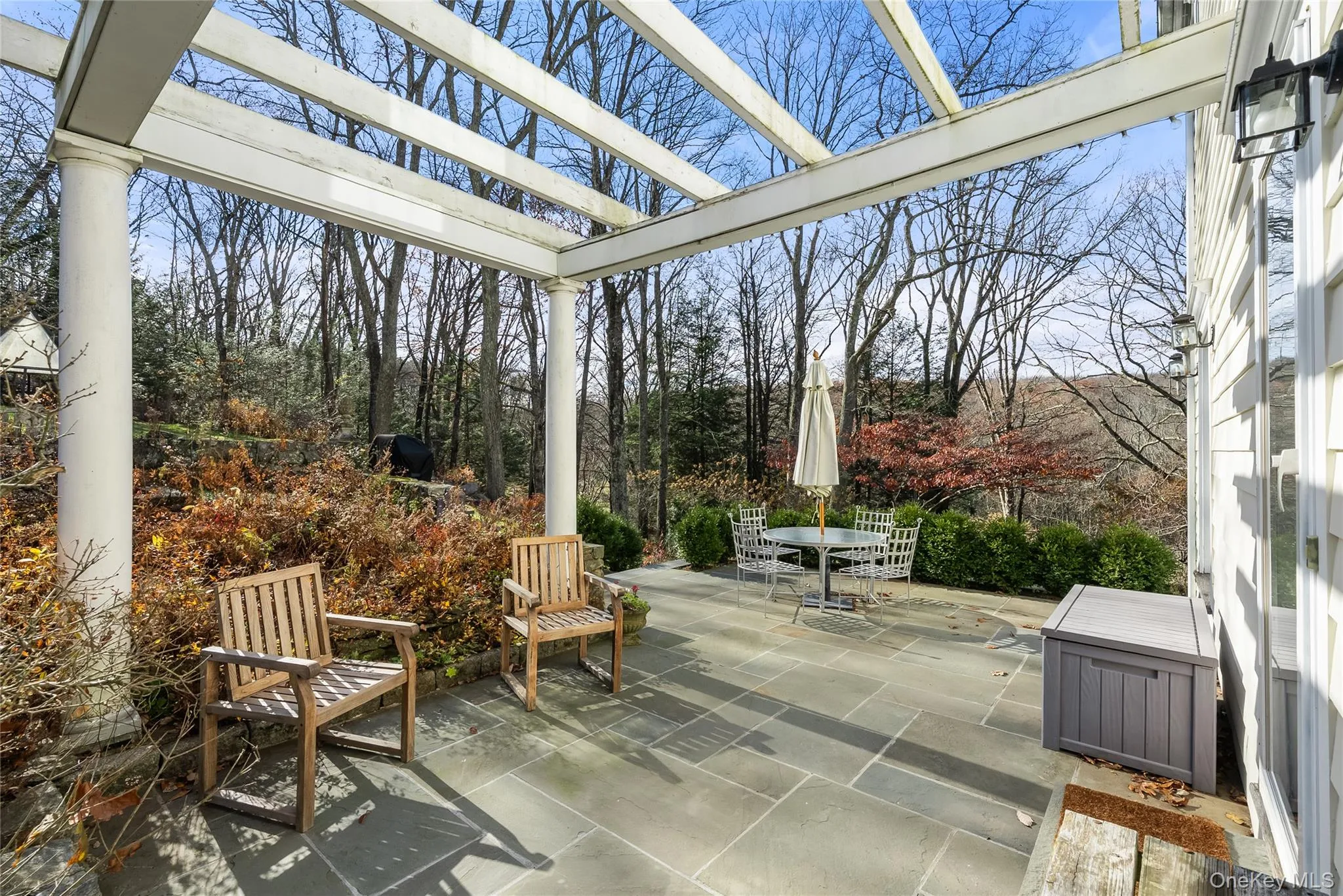 View of patio with outdoor dining space and a pergola View of patio with outdoor dining space and a pergola