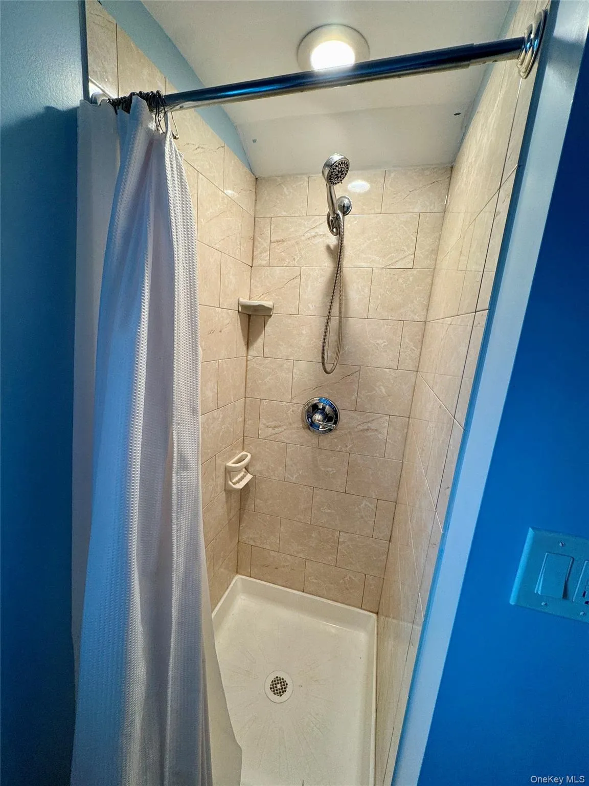 Bathroom with a stall shower Bathroom with a stall shower