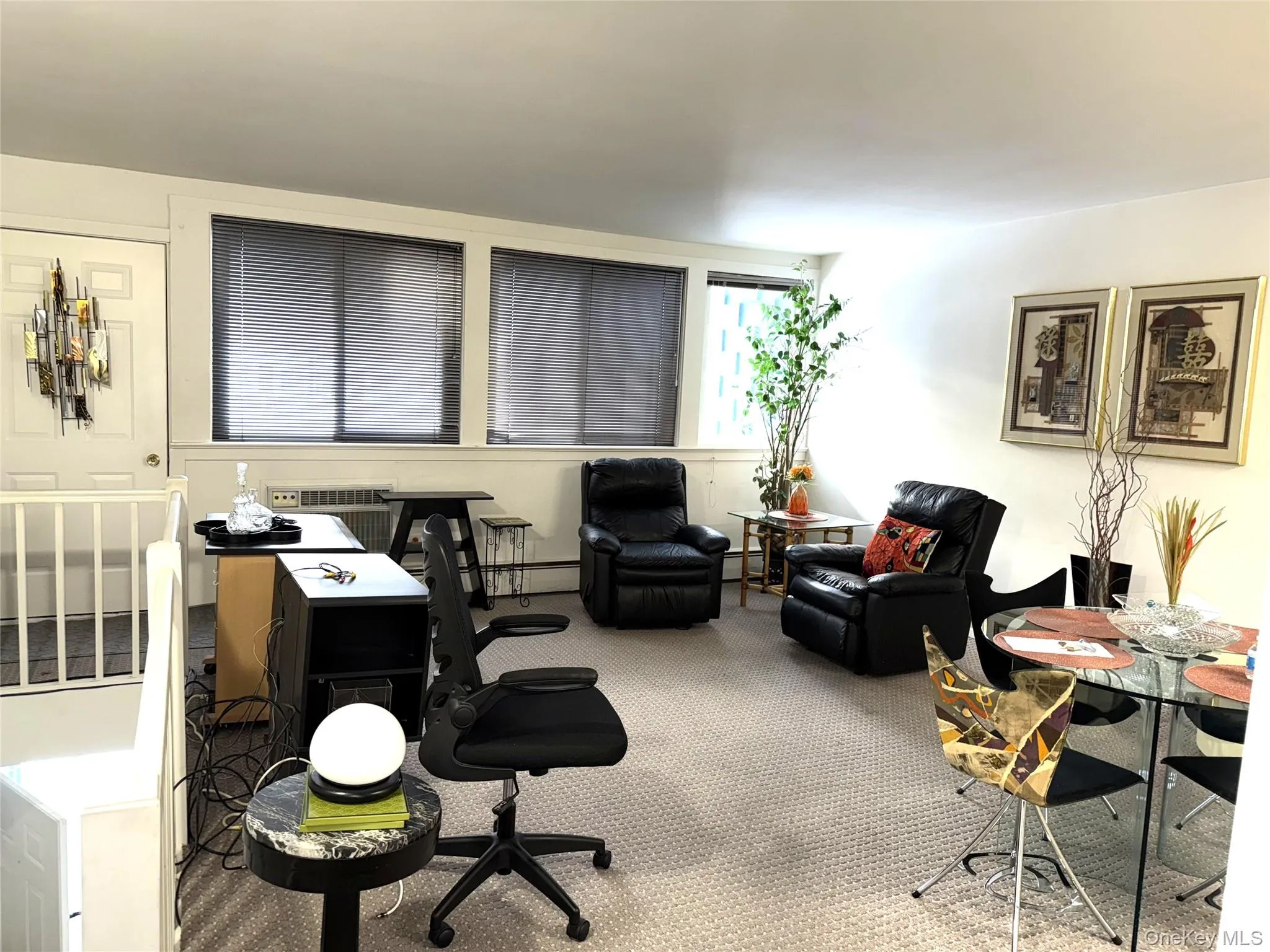 Office with carpet flooring and a baseboard radiator Office with carpet flooring and a baseboard radiator