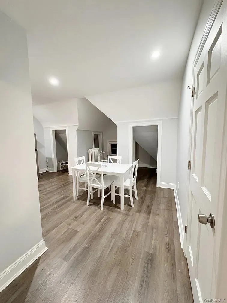 Dining space featuring light wood-style flooring and recessed lighting Dining space featuring light wood-style flooring and recessed lighting
