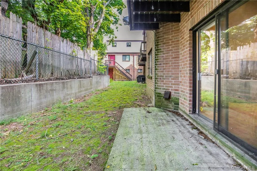 Back patio is a perfect spot for relaxing or grilling Back patio is a perfect spot for relaxing or grilling