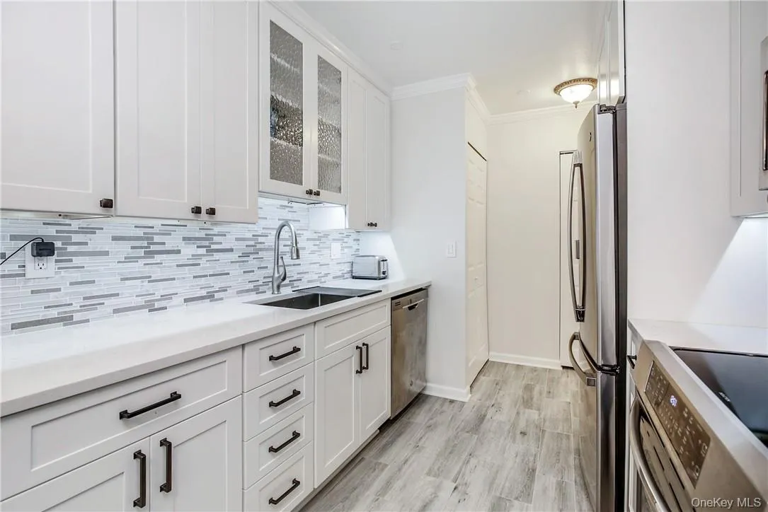 Gorgeous Quartz Counters, Stainless Appliances, Custom Backsplash... Gorgeous Quartz Counters, Stainless Appliances, Custom Backsplash...