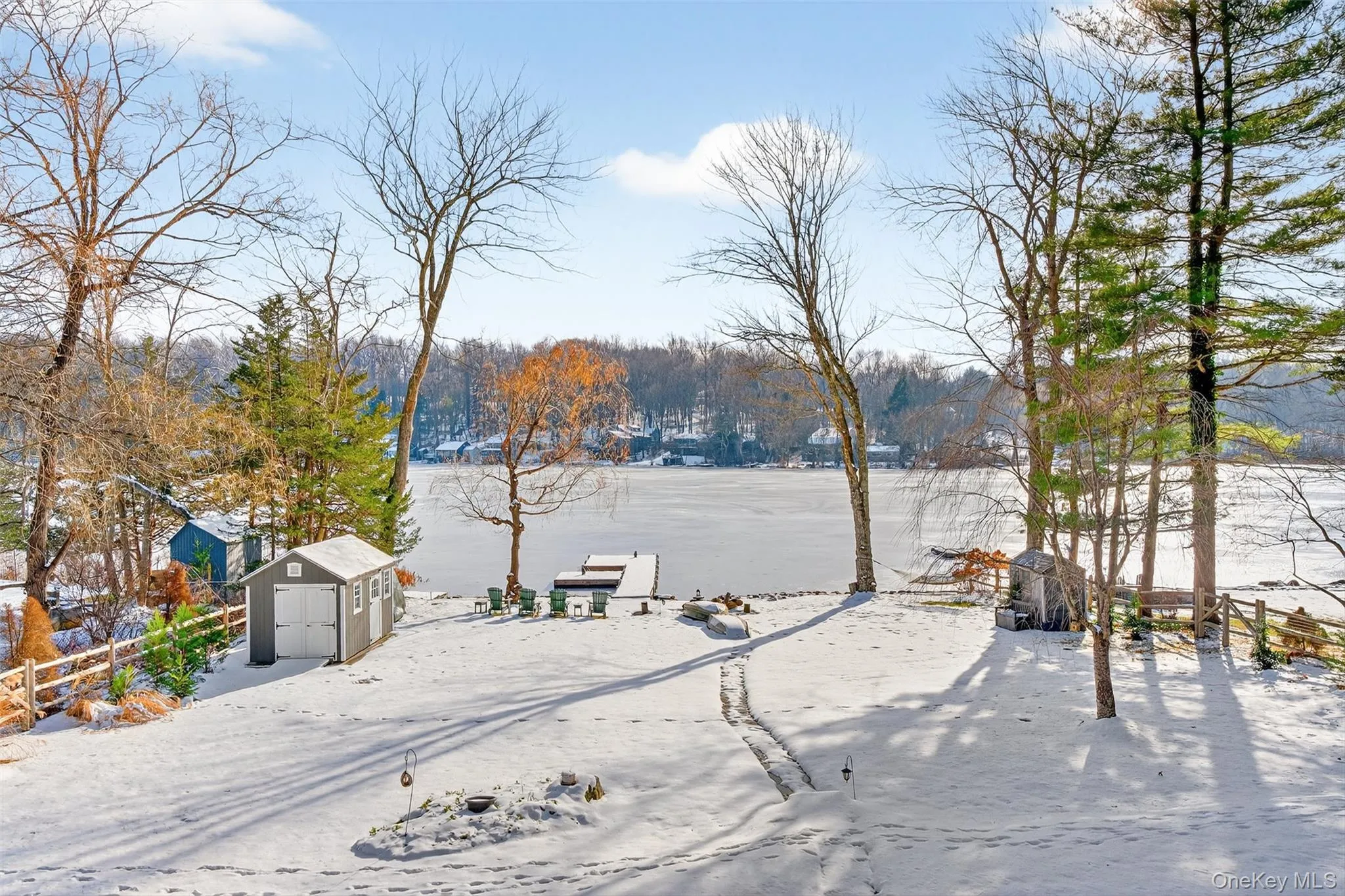 Snowy yard with a storage unit Snowy yard with a storage unit