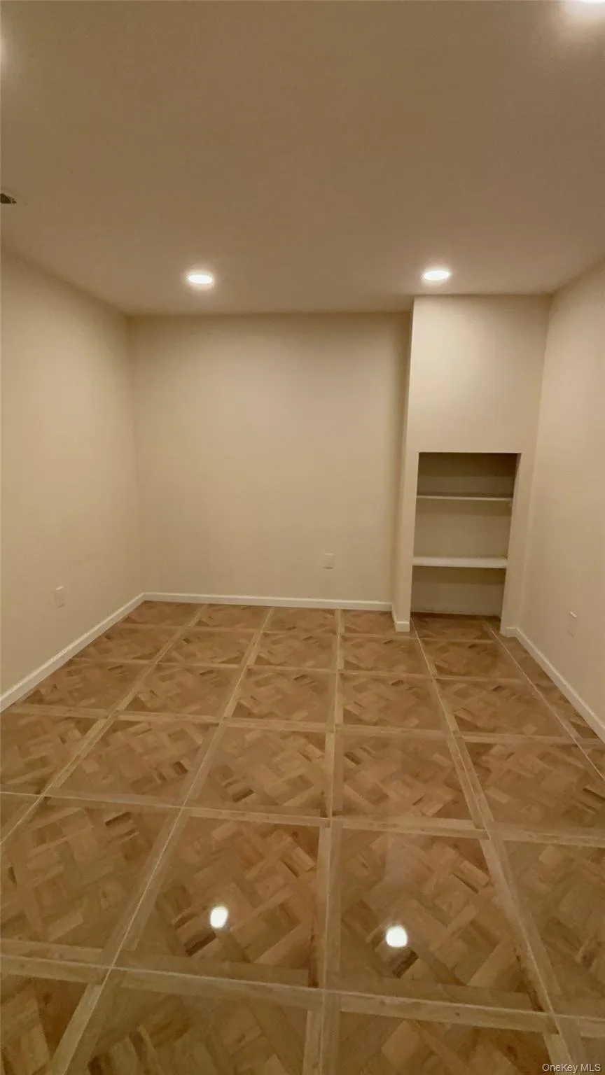 Finished below grade area featuring recessed lighting and baseboards Finished below grade area featuring recessed lighting and baseboards