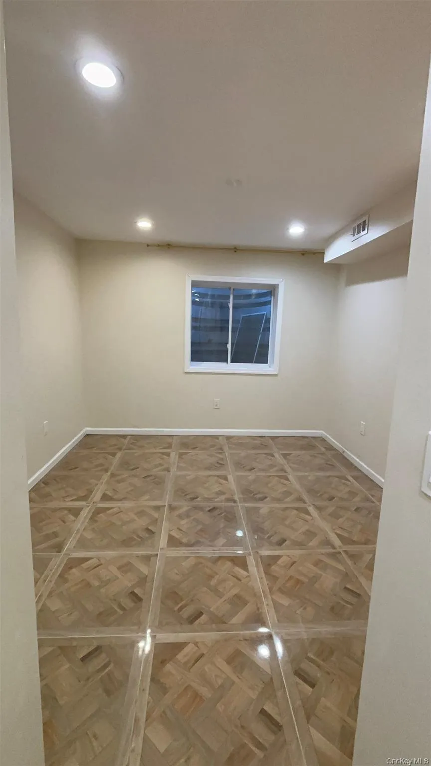 Finished below grade area featuring recessed lighting and baseboards Finished below grade area featuring recessed lighting and baseboards