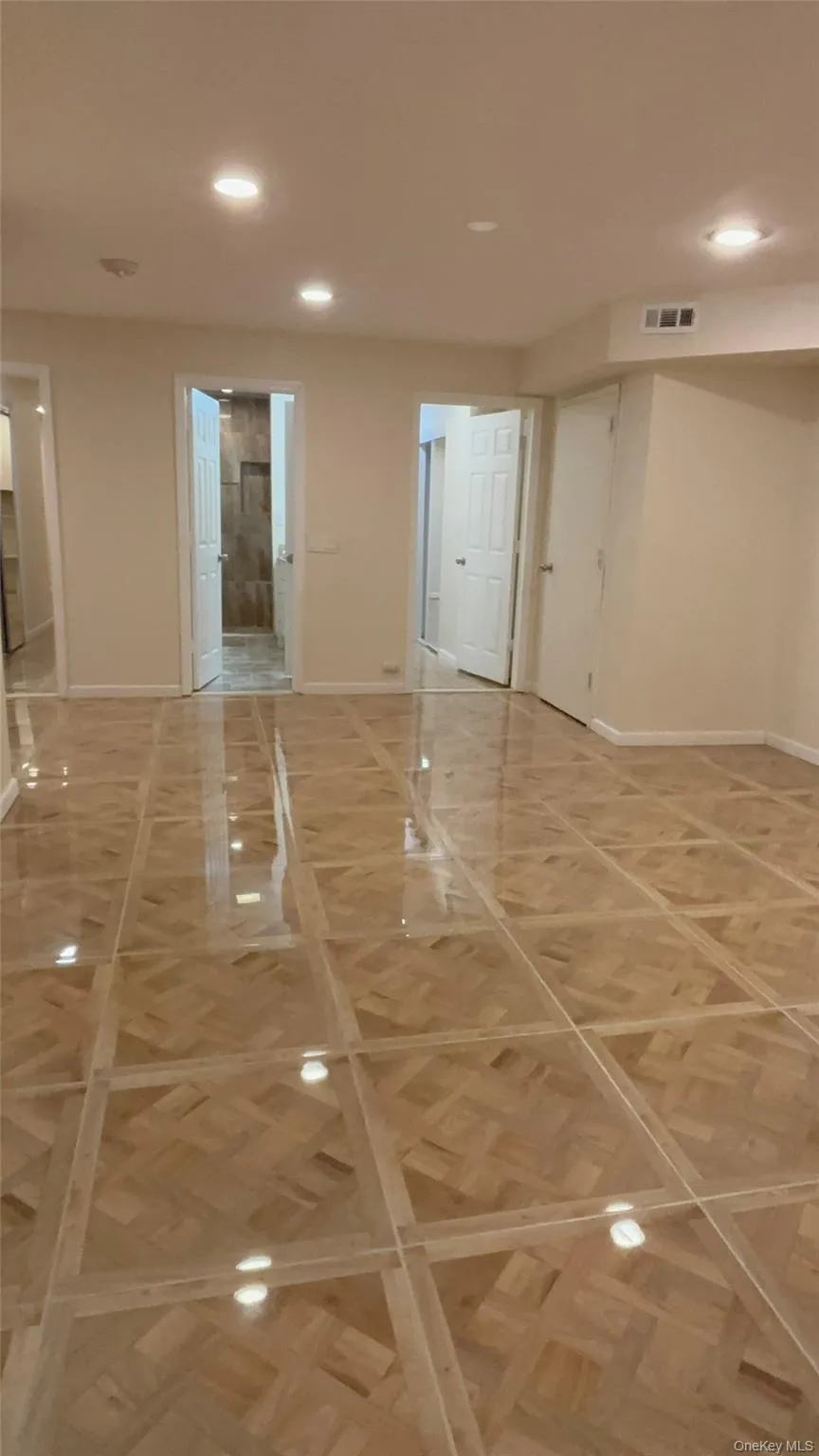 Unfurnished room featuring recessed lighting and baseboards Unfurnished room featuring recessed lighting and baseboards