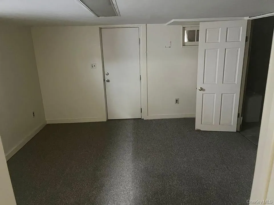 Spare room featuring baseboards Spare room featuring baseboards