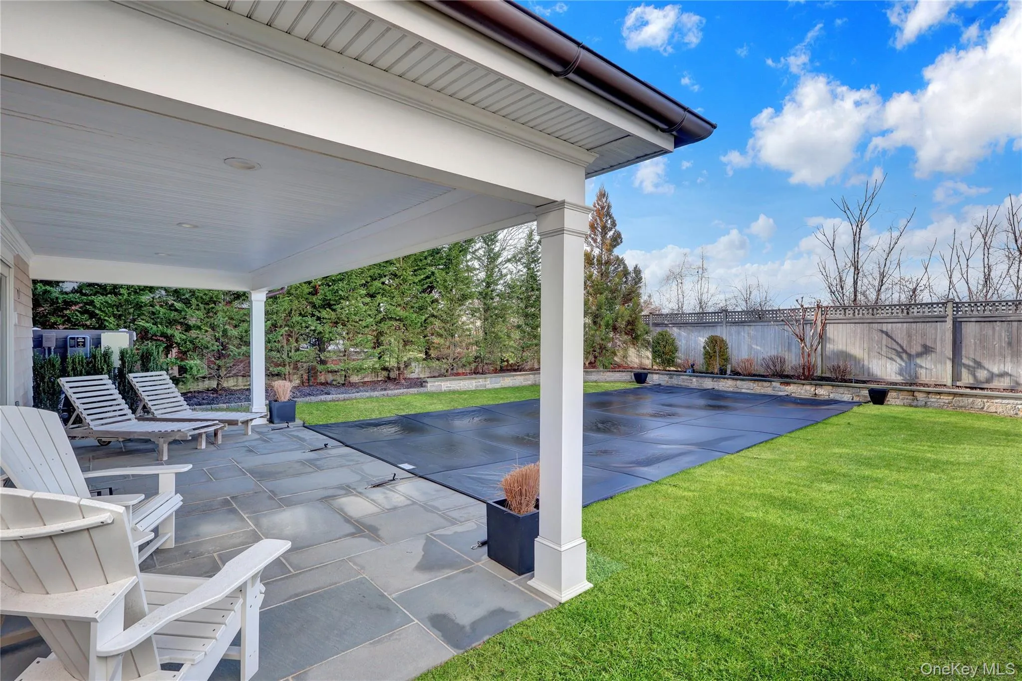 Fenced backyard featuring a patio Fenced backyard featuring a patio