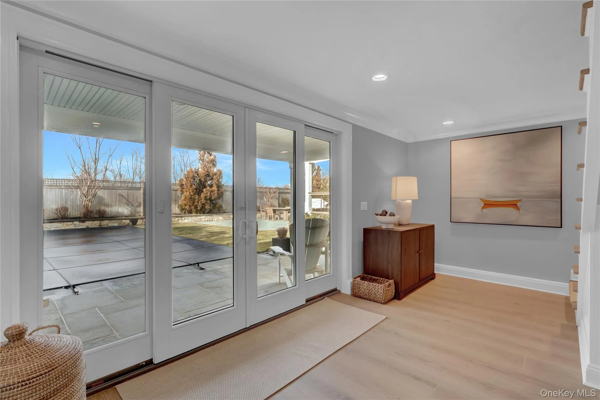 Entryway featuring wood finished floors and recessed lighting Entryway featuring wood finished floors and recessed lighting