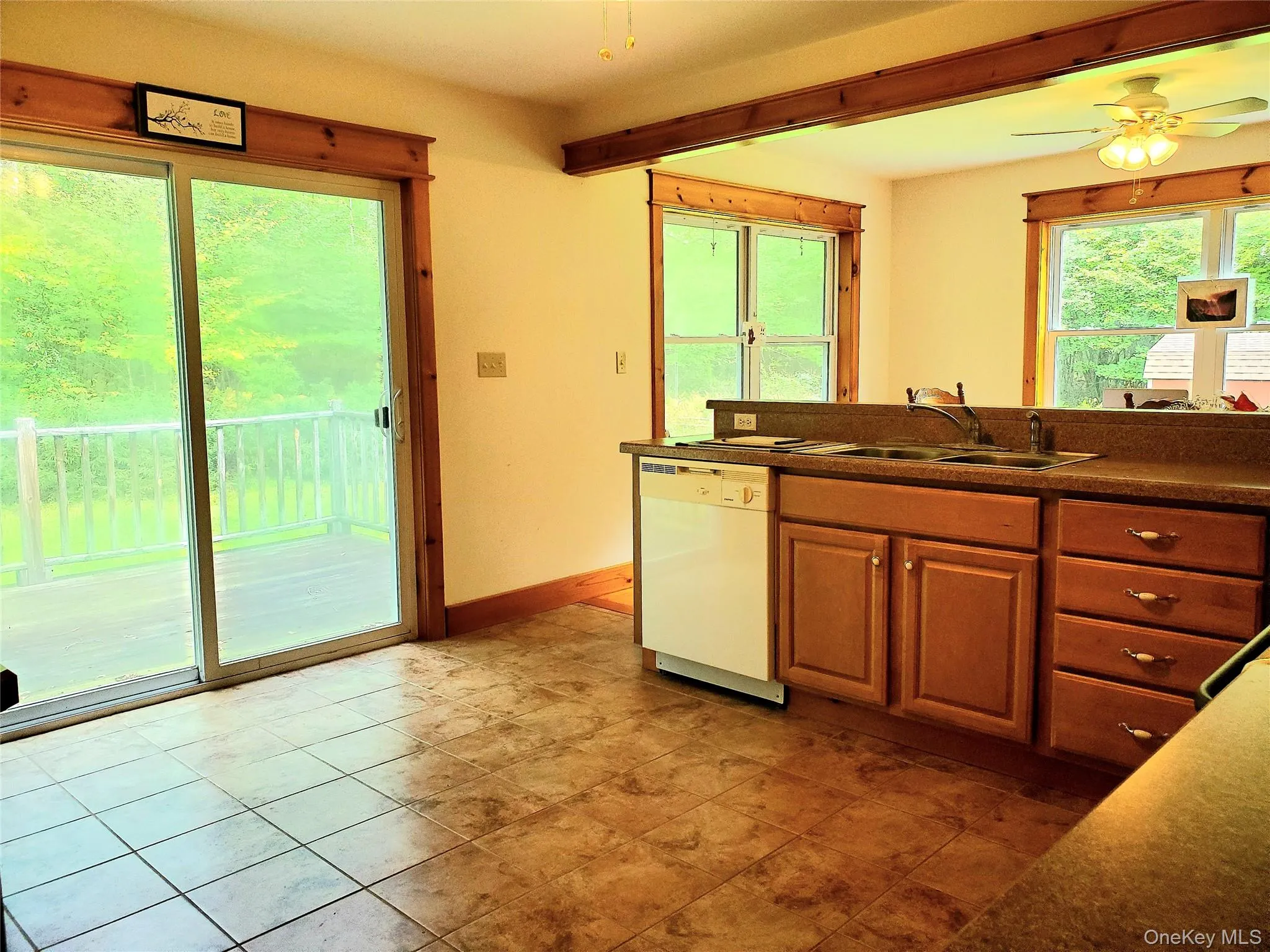 Kitchen with sliding doors to back deck Kitchen with sliding doors to back deck