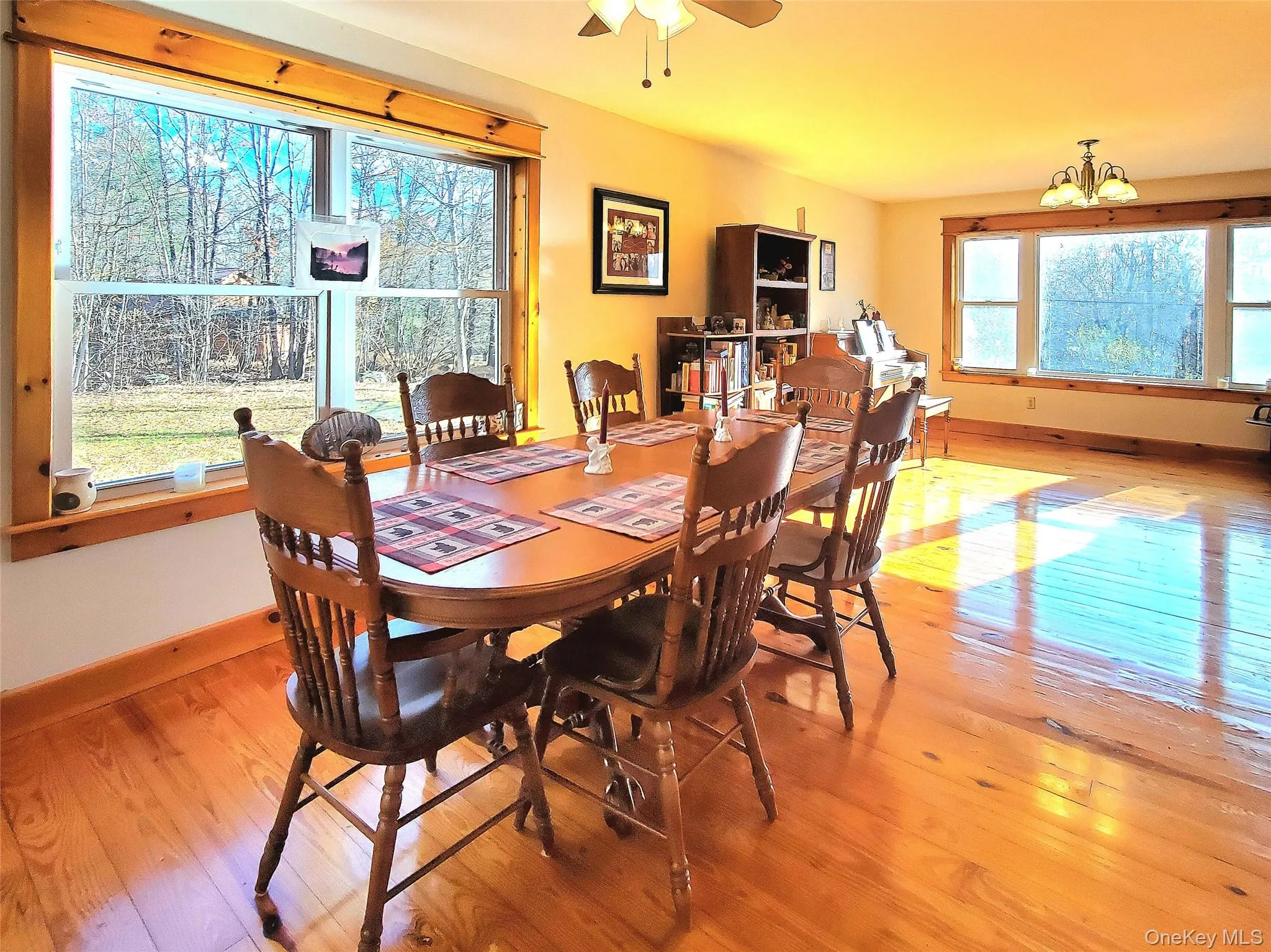 Hardwood floors, large windows with wood trim Hardwood floors, large windows with wood trim