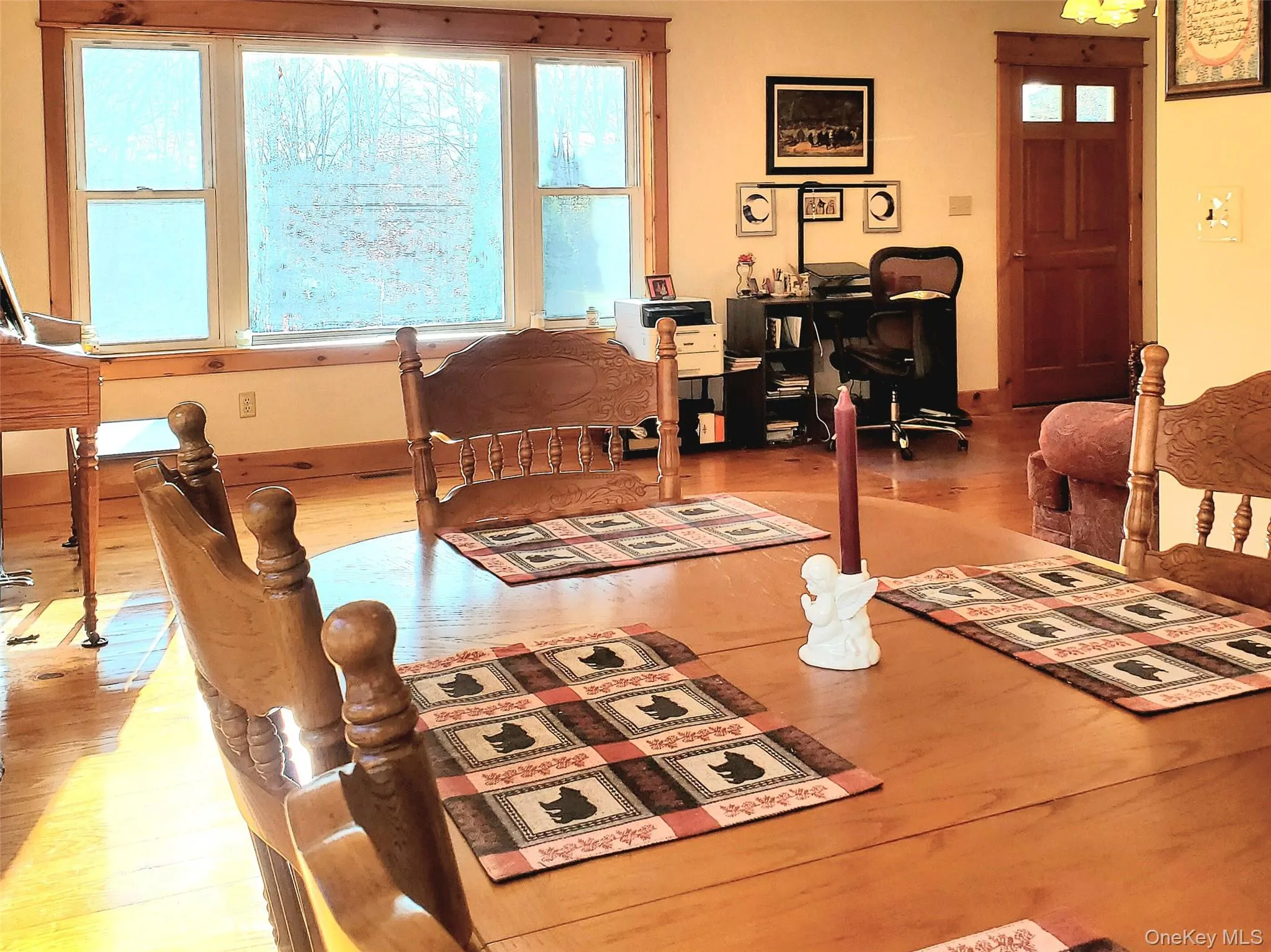 Open concept dining room off kitchen looking into living room Open concept dining room off kitchen looking into living room