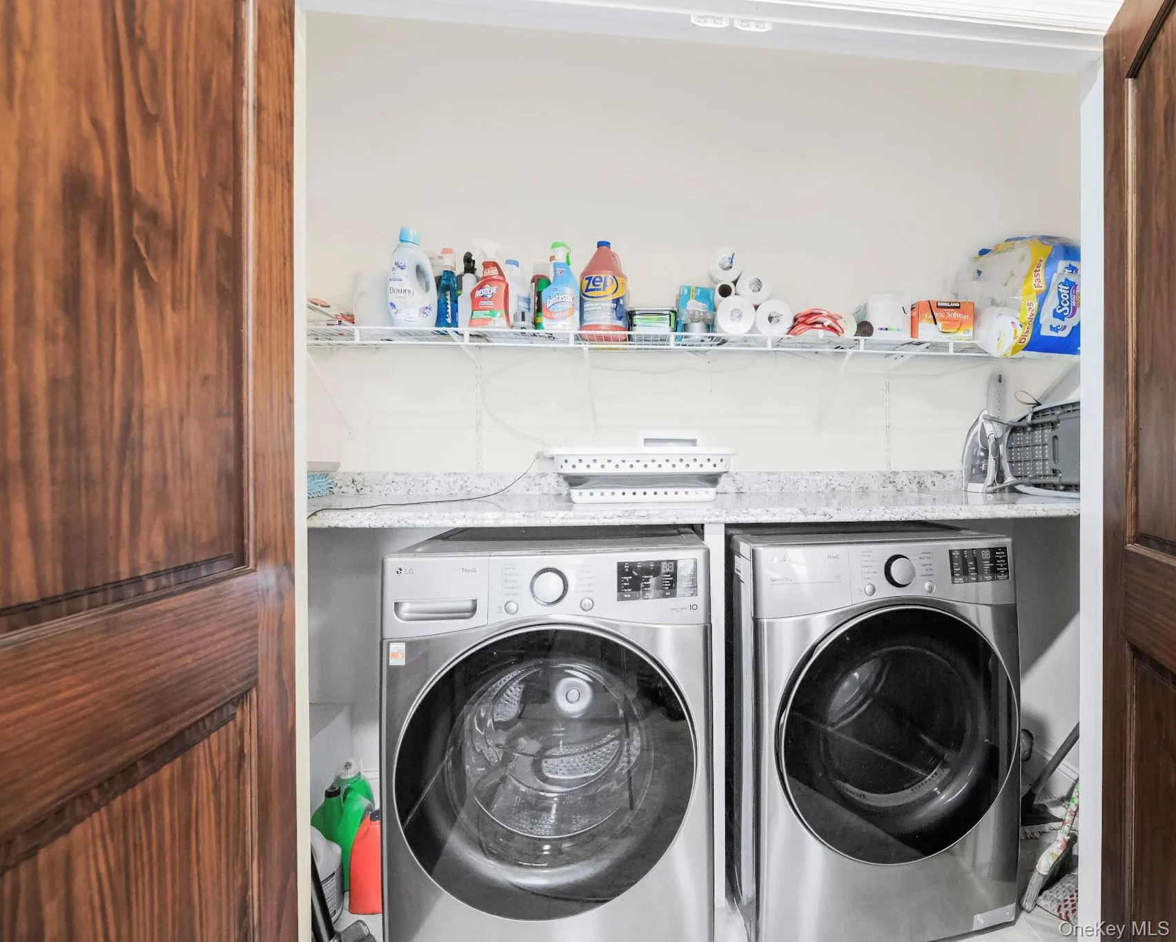 Laundry area with washer and clothes dryer Laundry area with washer and clothes dryer