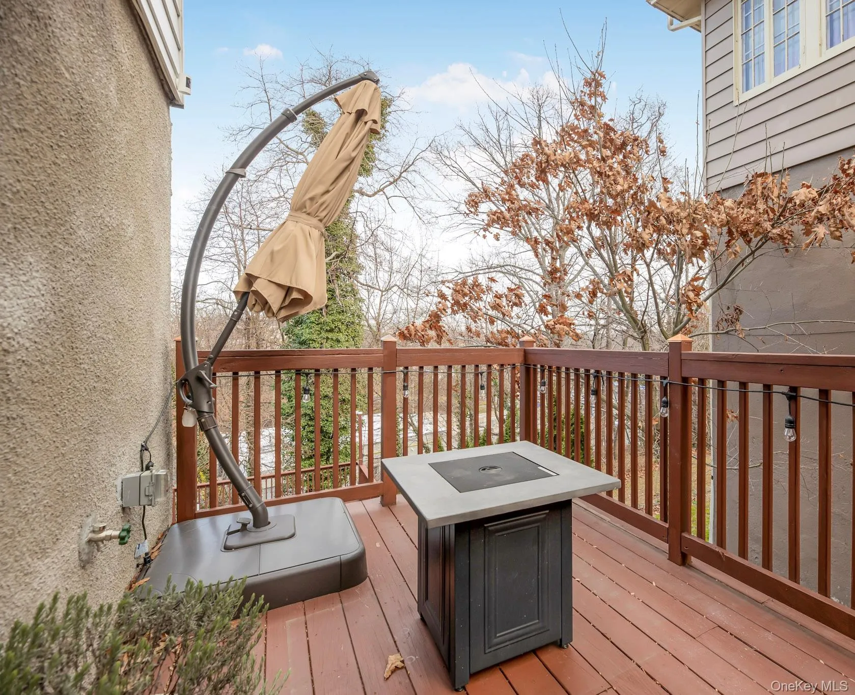 Wooden deck with a fire pit Wooden deck with a fire pit