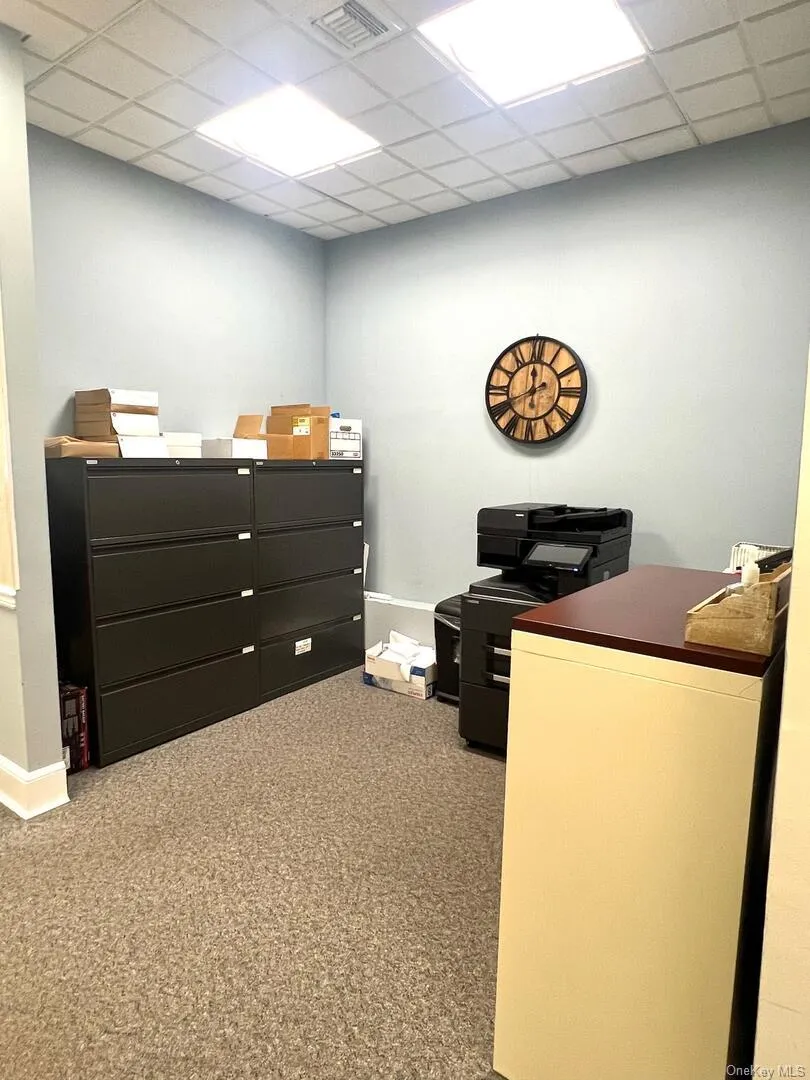 Office area featuring a paneled ceiling Office area featuring a paneled ceiling