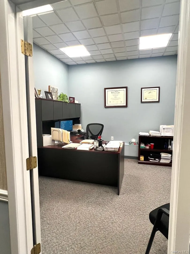 Office area with a drop ceiling Office area with a drop ceiling