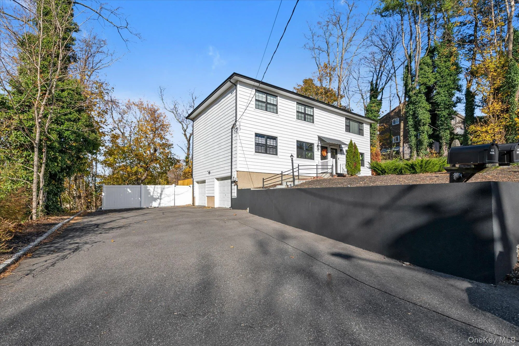 Ample driveway parking and one car garage Ample driveway parking and one car garage