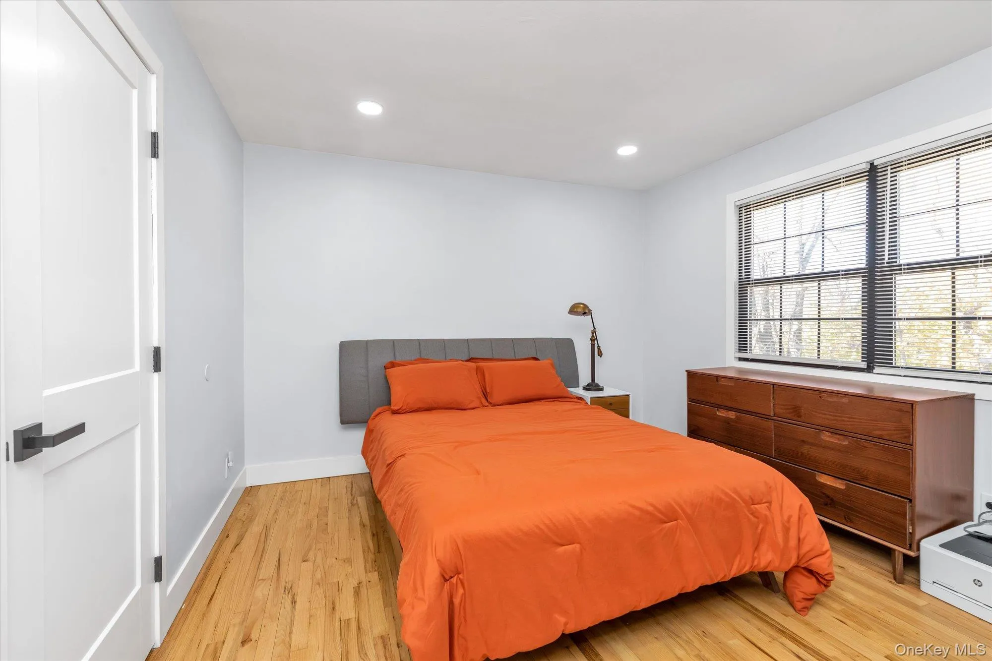 Primary bedroom with hardwood floors Primary bedroom with hardwood floors