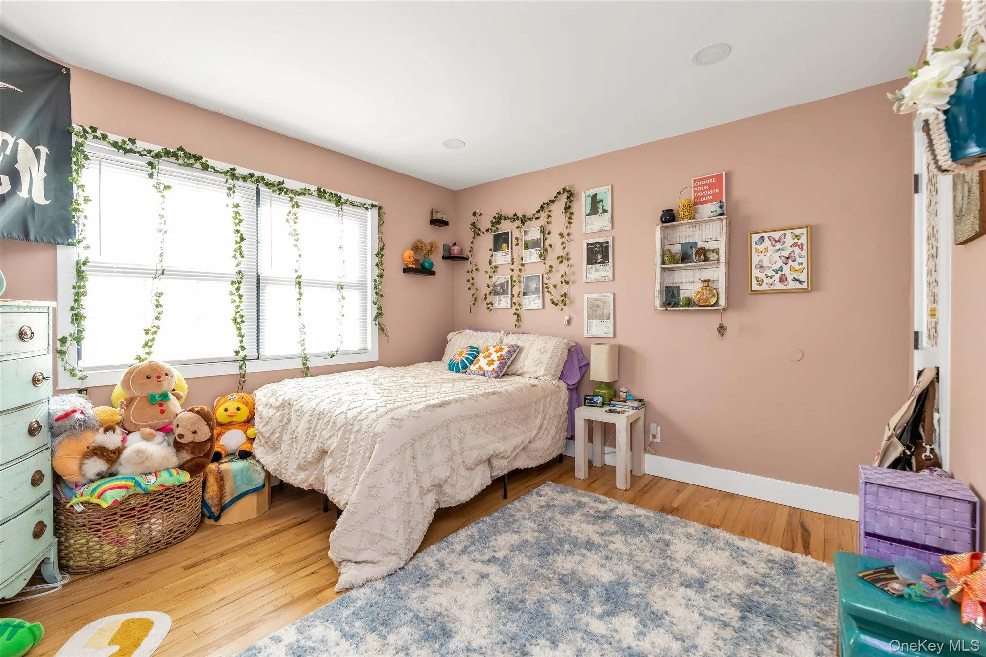 Bedroom #3 with hard wood flooring Bedroom #3 with hard wood flooring
