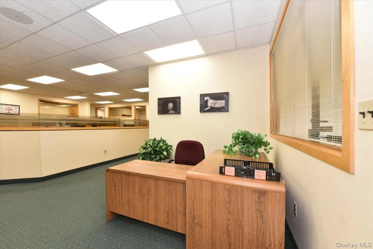 Office with a drop ceiling Office with a drop ceiling