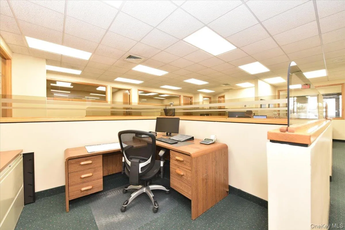 Office area with a drop ceiling Office area with a drop ceiling