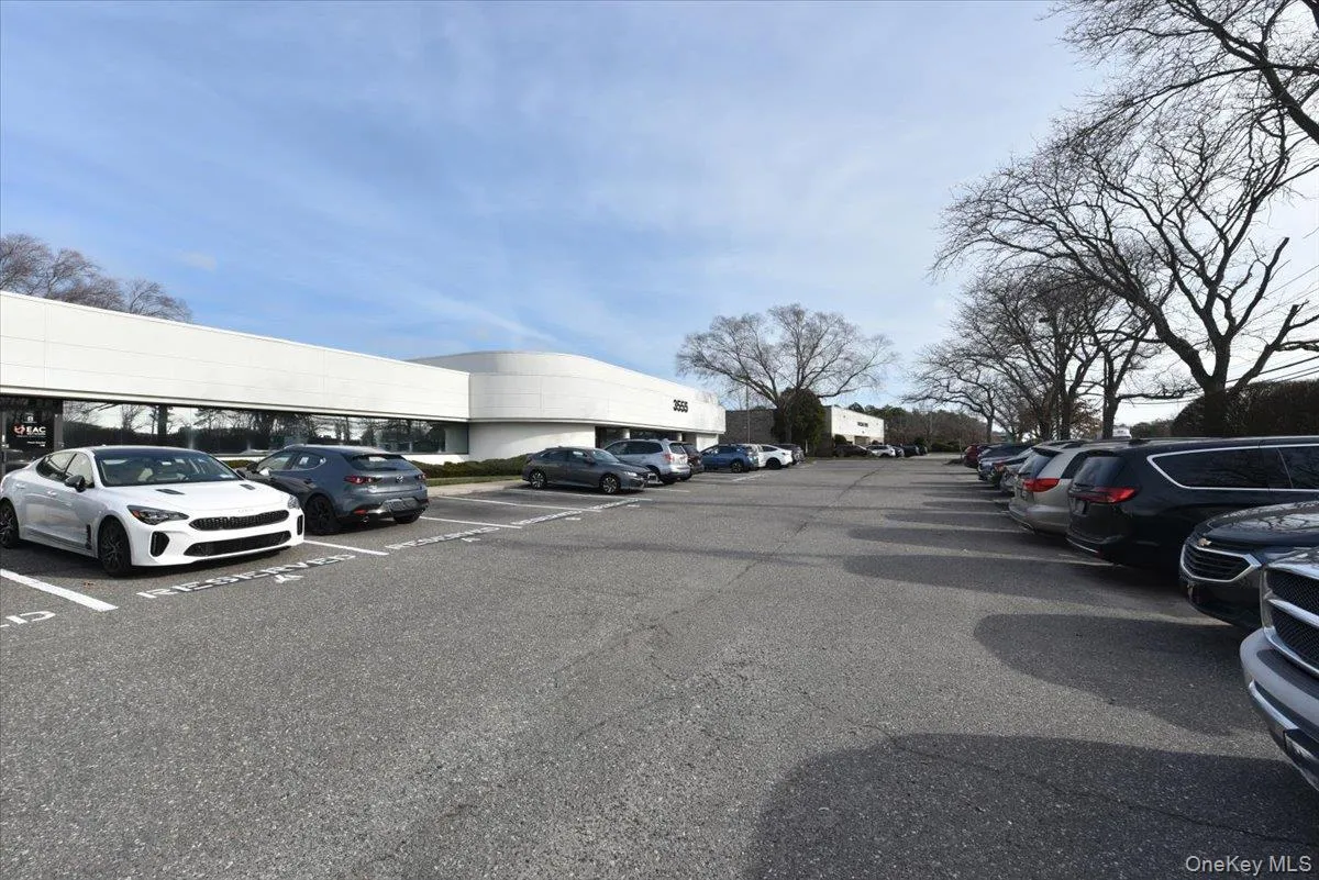 View of uncovered parking lot View of uncovered parking lot