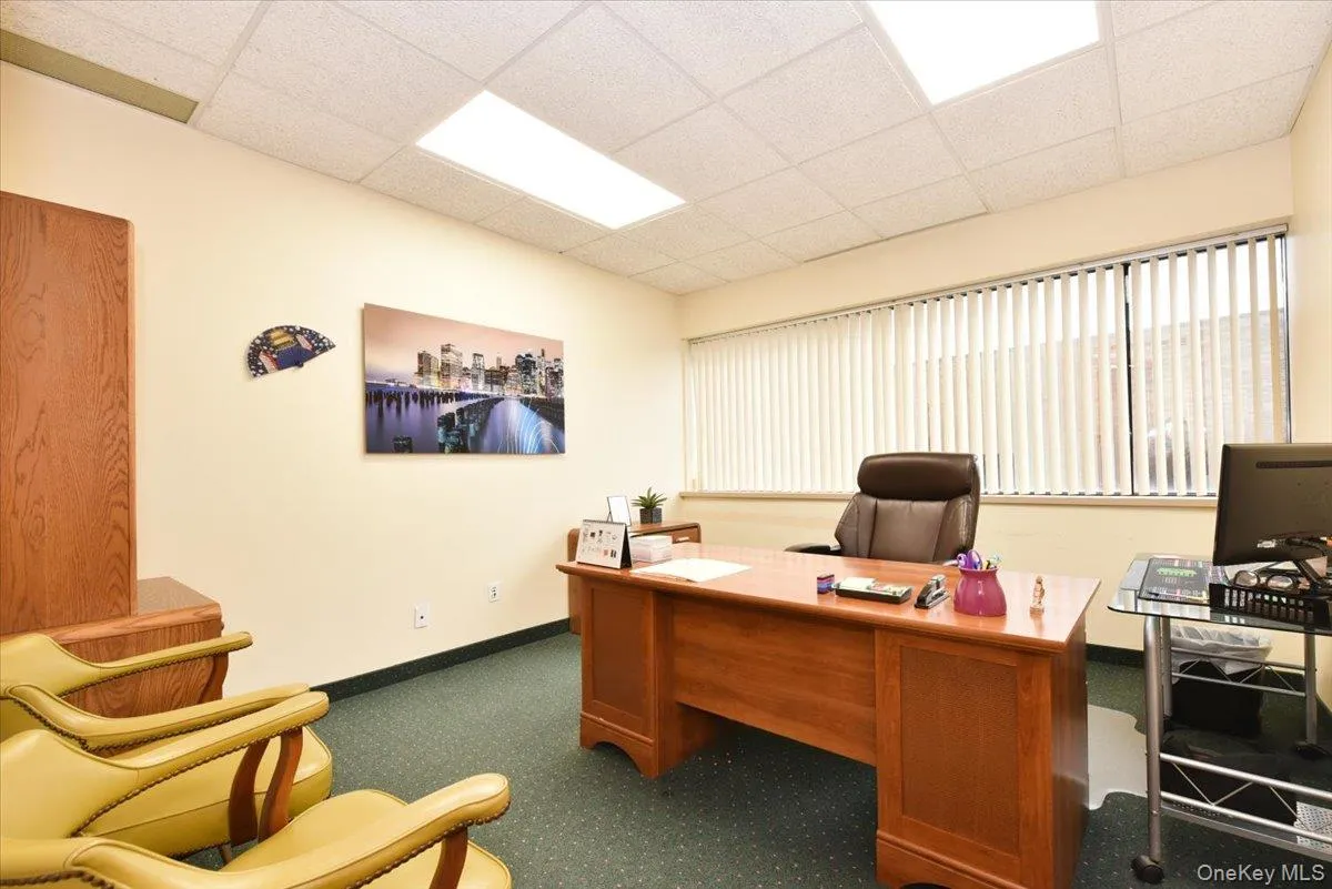 Home office with a drop ceiling Home office with a drop ceiling