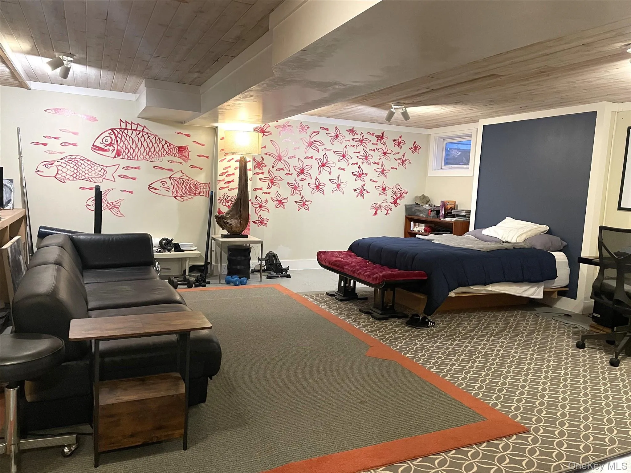 Carpeted bedroom with wooden ceiling and ornamental molding