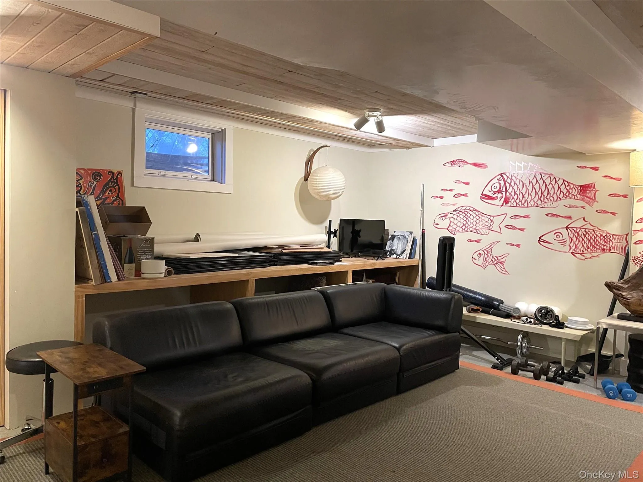 Living room with wood ceiling