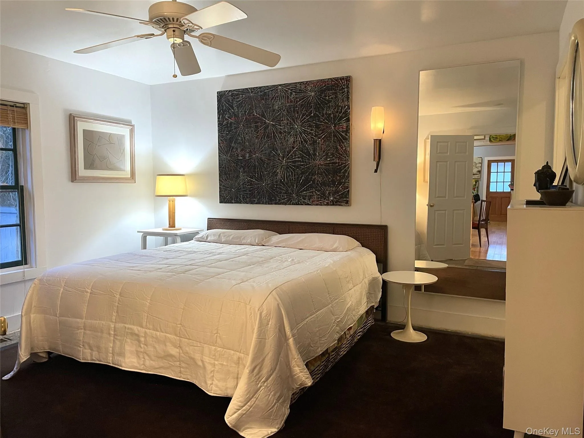 Bedroom featuring a ceiling fan
