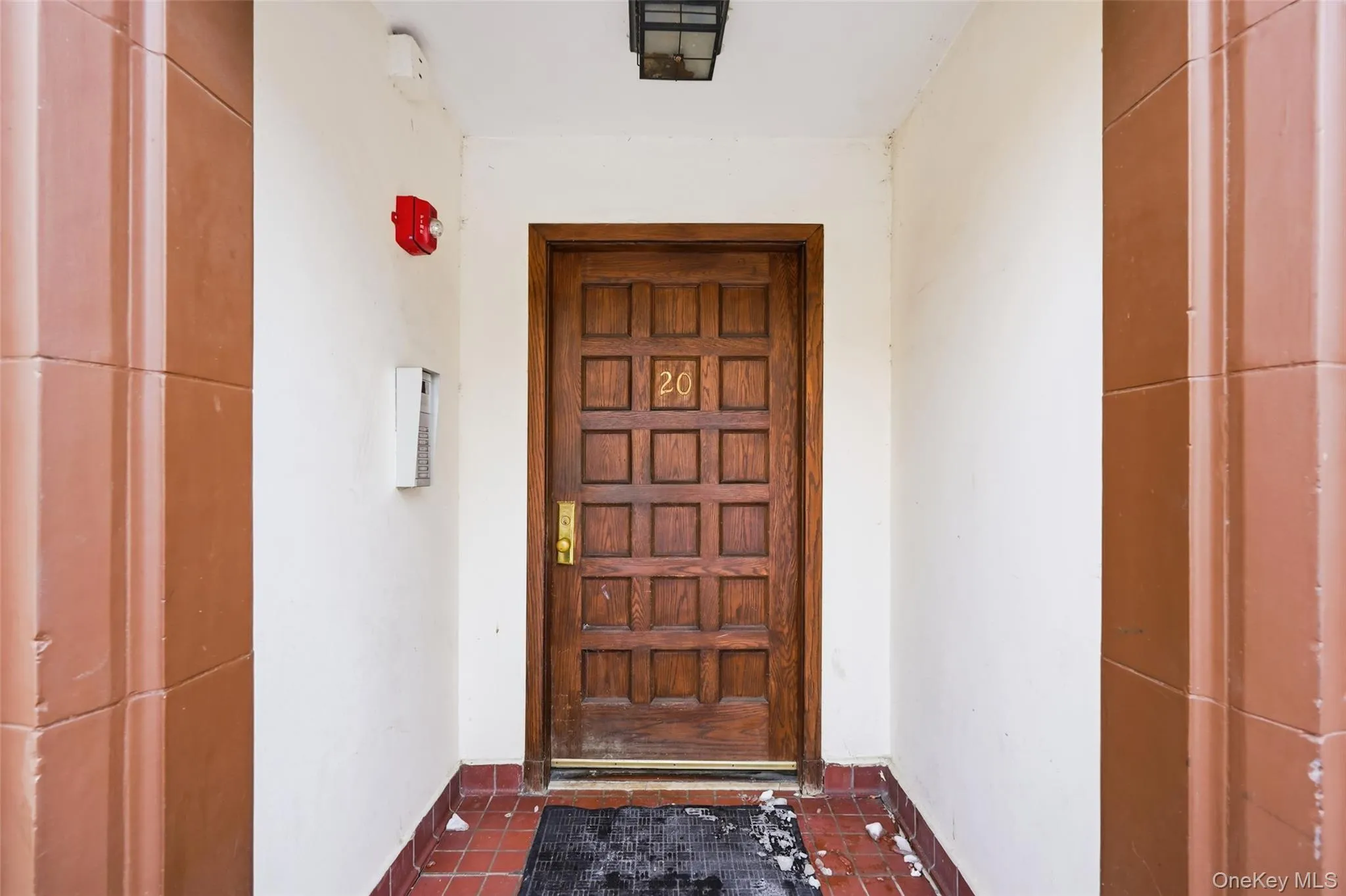 Entrance to property with stucco siding Entrance to property with stucco siding