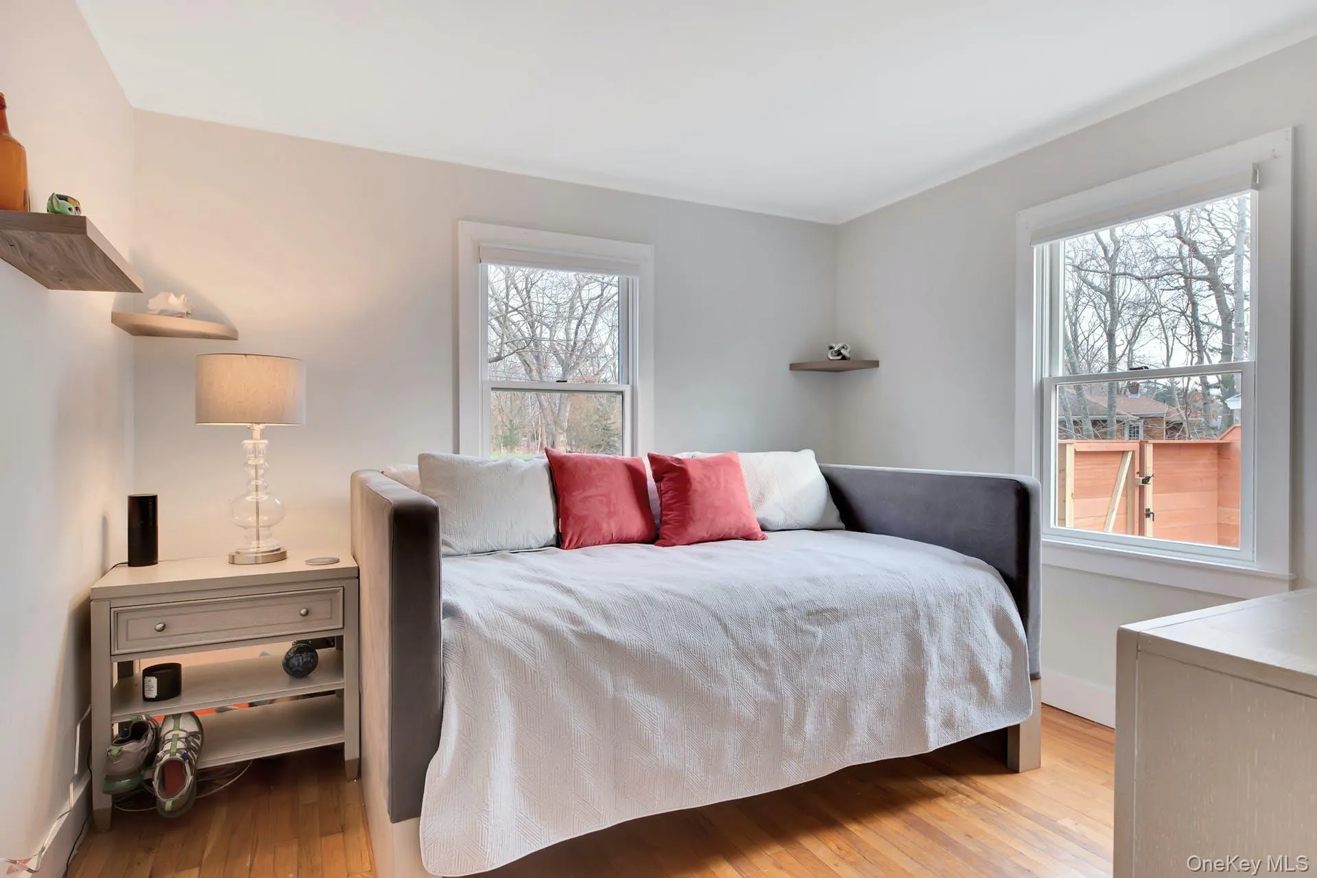 Bedroom with light wood-type flooring Bedroom with light wood-type flooring