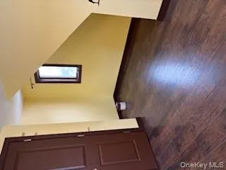 Bonus room with dark wood-type flooring Bonus room with dark wood-type flooring